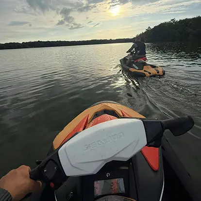 Guests riding jet skis on Percy Priest Lake during a Nashville holiday rental